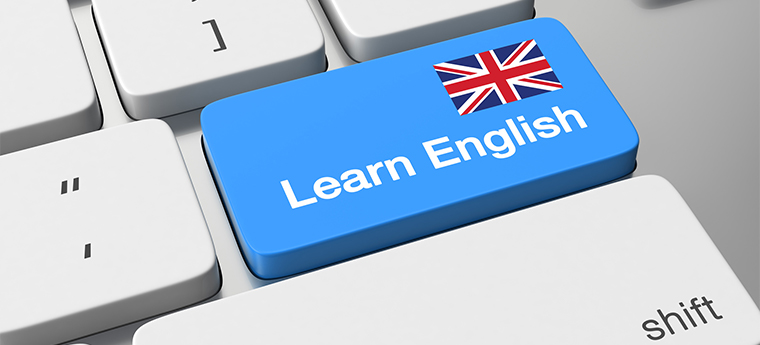 Tecla enter do teclado é substituída por uma azul com a inscrição Learn English e a bandeira da Grã-Bretanha
