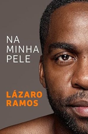 Capa com close do rosto de Lázaro Ramos e o título "Na minha pele" em letras brancas.